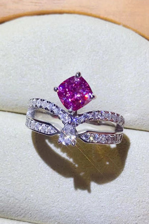 Pink moissanite bow ring with pavé detail in sterling silver