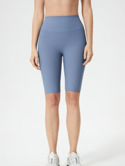 Ribbed contour cycling shorts in light blue with a high waist and mid-thigh length.