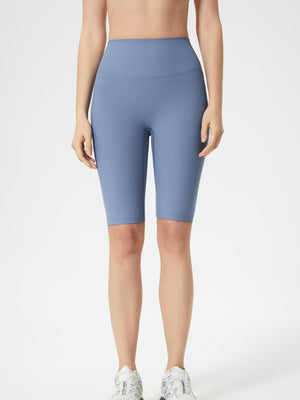 Ribbed contour cycling shorts in light blue with a high waist and mid-thigh length.