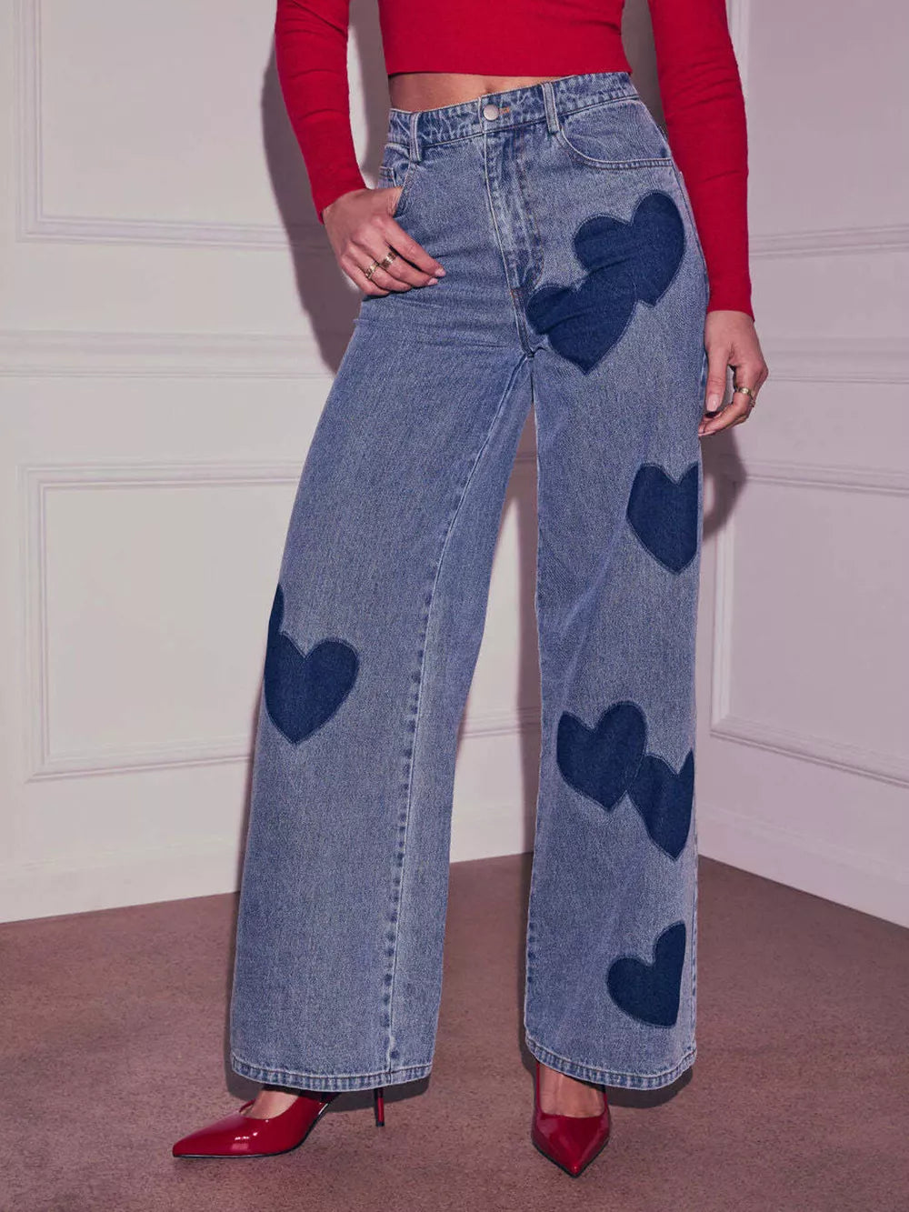Blue denim maternity jeans with heart patches, high waist, wide leg