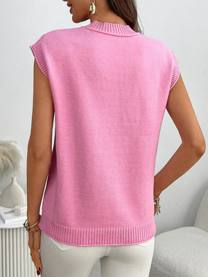 Pink ribbed knit sleeveless mock neck top with a relaxed fit.
