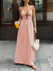 Striped halter neck maxi gown with plunging neckline and empire waist in pumpkin.