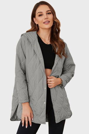 Light gray quilted hooded parka with snap front and diamond stitching.