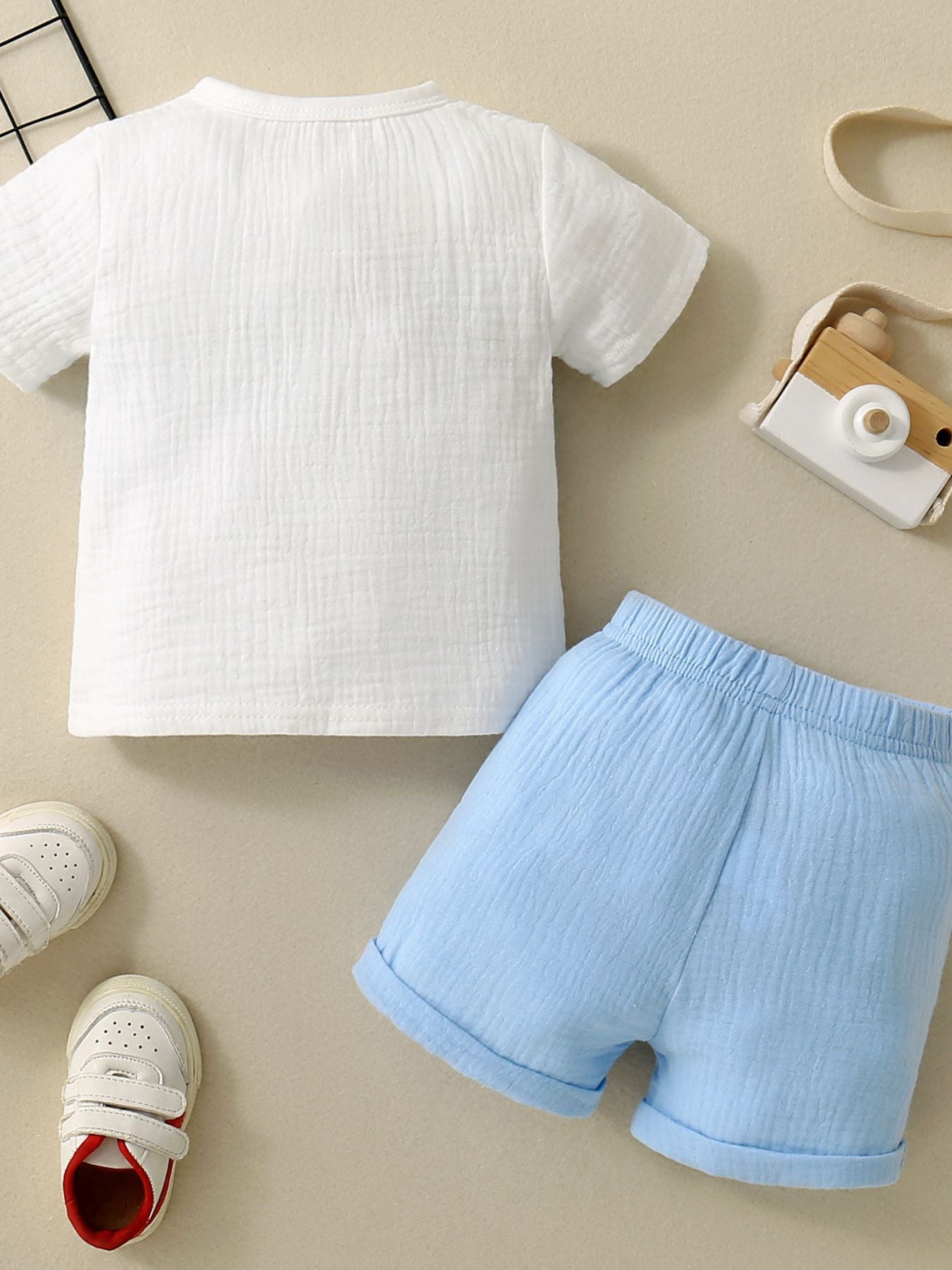 Children's white cotton gauze top and light blue shorts set