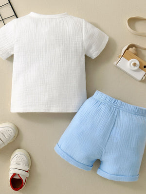 Children's white cotton gauze top and light blue shorts set