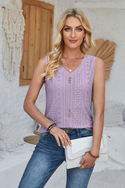 Lavender perforated button-down sleeveless top with V-neck and gold buttons.