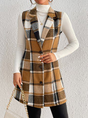 Camel plaid blazer vest with tailored silhouette and button front, worn over a white turtleneck.