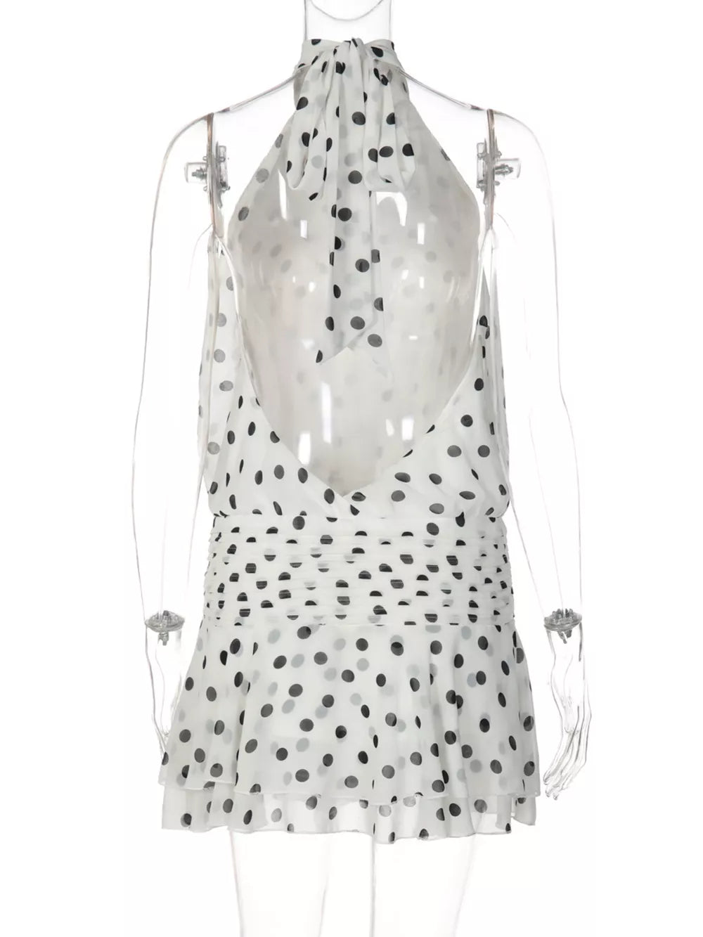 White polka dot halter neck mini dress with ruched waist and tiered hem
