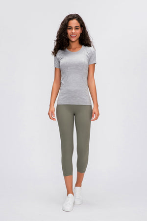Gray seamless activewear tee with short sleeves and subtle contouring details.