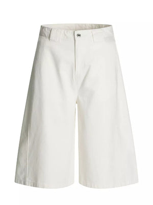 White wide-leg capri trousers with a button closure and belt loops.