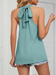 Teal cami with ruched high neck and tie back detail.