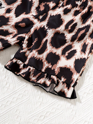 Baby leopard print shorts with ruffled hem detail