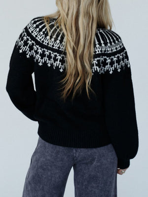 Black acrylic sweater with Fair Isle pattern and puff sleeves