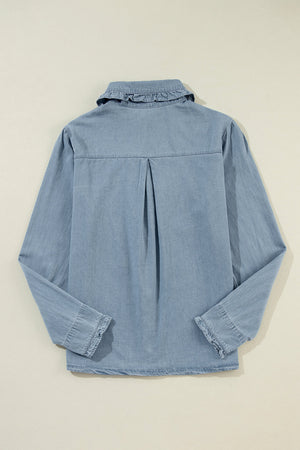 Indigo button-up blouse with ruffled collar and frayed hem.