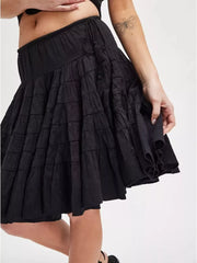 Black tiered drawstring mini skirt with ruffled hem detail