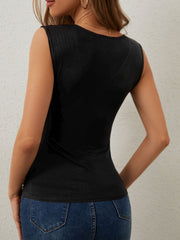 Black tank top with shoulder embellishments and a scoop neckline.