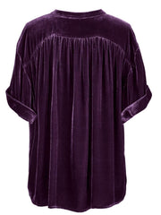 Plum purple velvet button-down blouse with mandarin collar and gathered back detail.