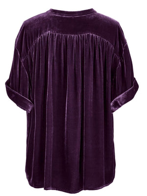 Plum purple velvet button-down blouse with mandarin collar and gathered back detail.