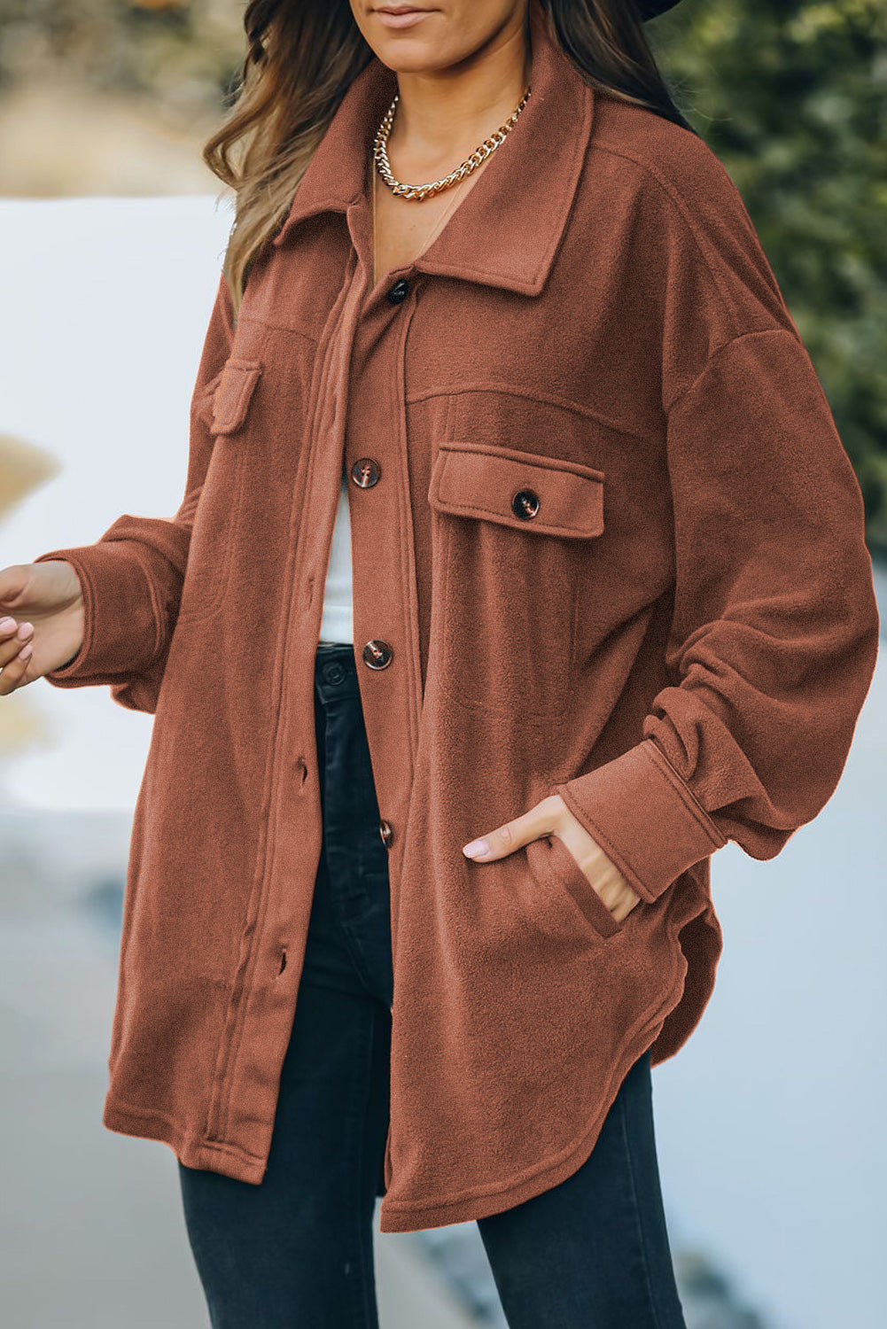 Fleece shirt jacket in Caramel with patch pockets and button front.