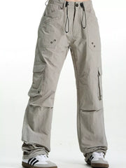 Grey relaxed fit cargo pants with multiple pockets and drawstring waist.
