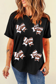 Black t-shirt with all-over football bow graphic print