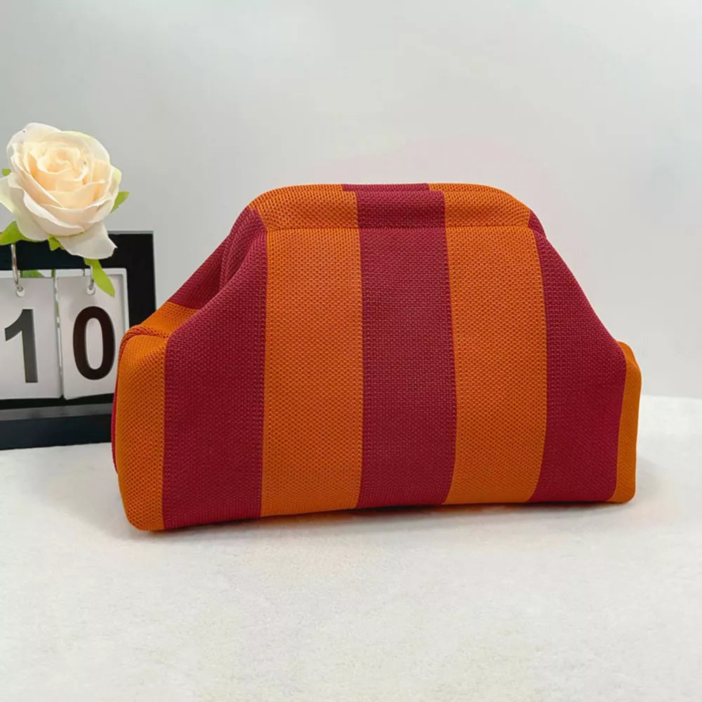 Vibrant knit clutch with striking red and orange stripes