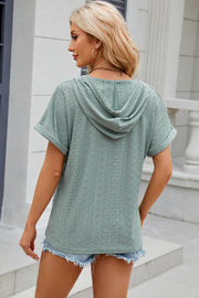 Light Green perforated henley hooded tee with short sleeves and a relaxed fit.