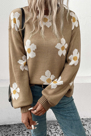 Khaki acrylic sweater with white daisy motif and balloon sleeves.