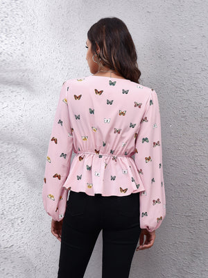 Dusty pink peplum blouse with gathered waist and allover butterfly print.
