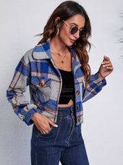Chic plaid pocket jacket in dark blue with button closure and collared neckline.