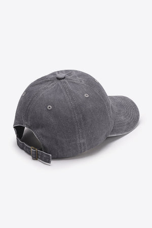 Washed cotton baseball cap in gray with adjustable strap and metal buckle.