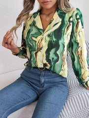 Yellow-green abstract swirl print silk blouse with button front and collar