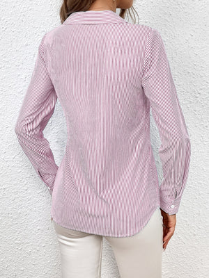 Blush pink and white striped wrap blouse with button cuffs and a collared neckline.