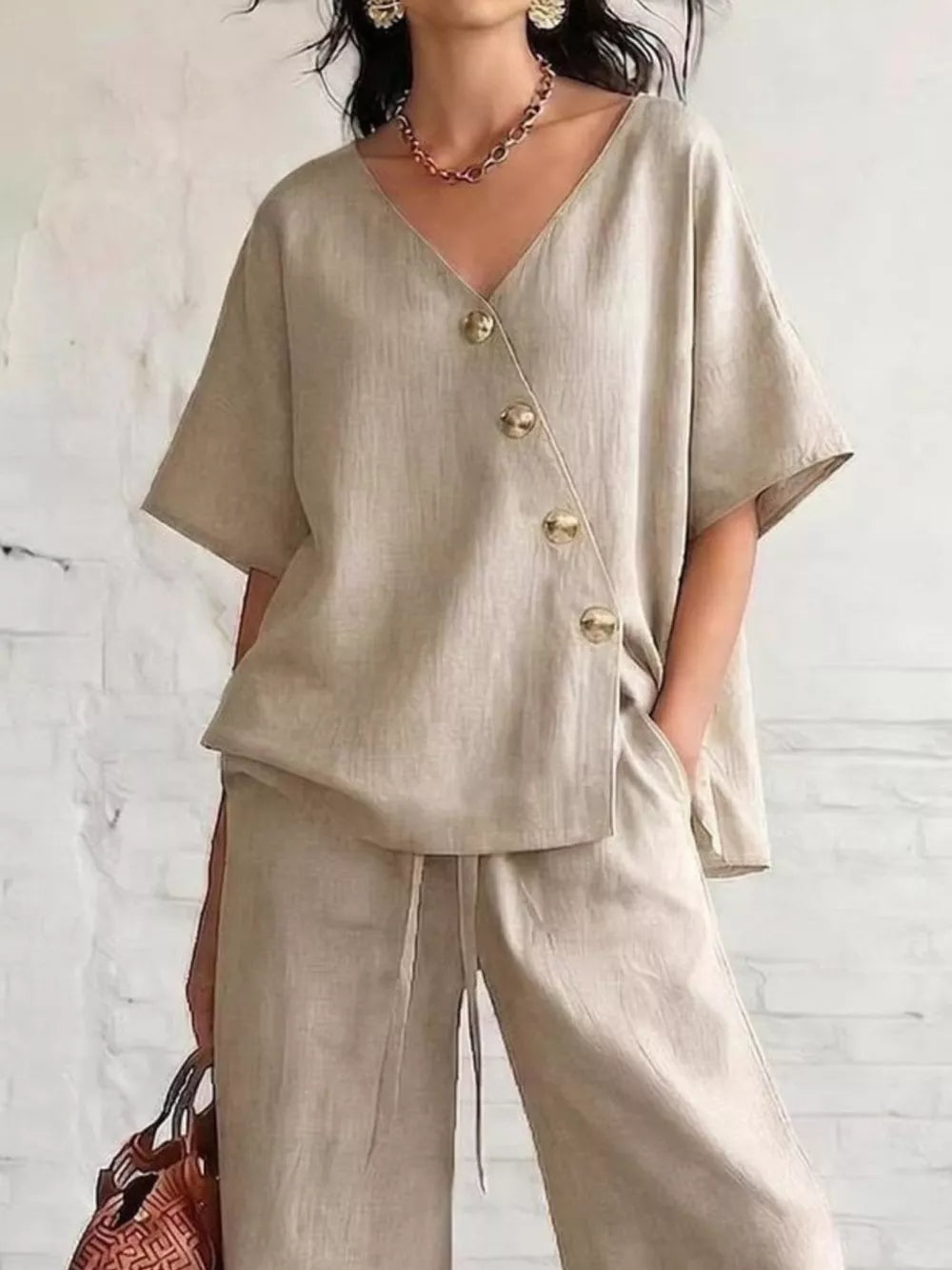 Full Size Surplice Half Sleeve Top And Wide-leg Pants Set, editorial view