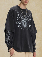 Black layered graphic sweatshirt with distressed effect and flame design on sleeves.