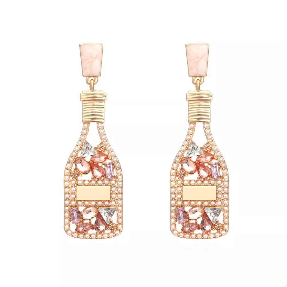 Champagne bottle drop earrings with pink and clear crystals and pearl accents.
