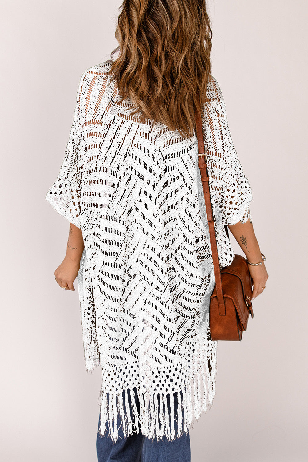 White open knit chevron fringe cardigan with crochet details and elbow sleeves.