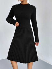 Black ribbed knit fit-and-flare co-ord set with long sleeves and A-line skirt.