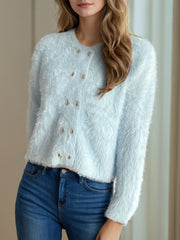 Fluffy double-breasted knit cardigan in mint blue with silver buttons.