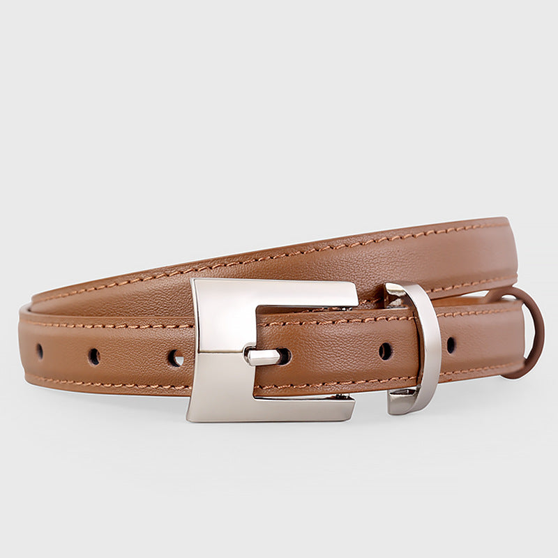 Caramel cowhide leather belt with silver buckle and keeper loop.