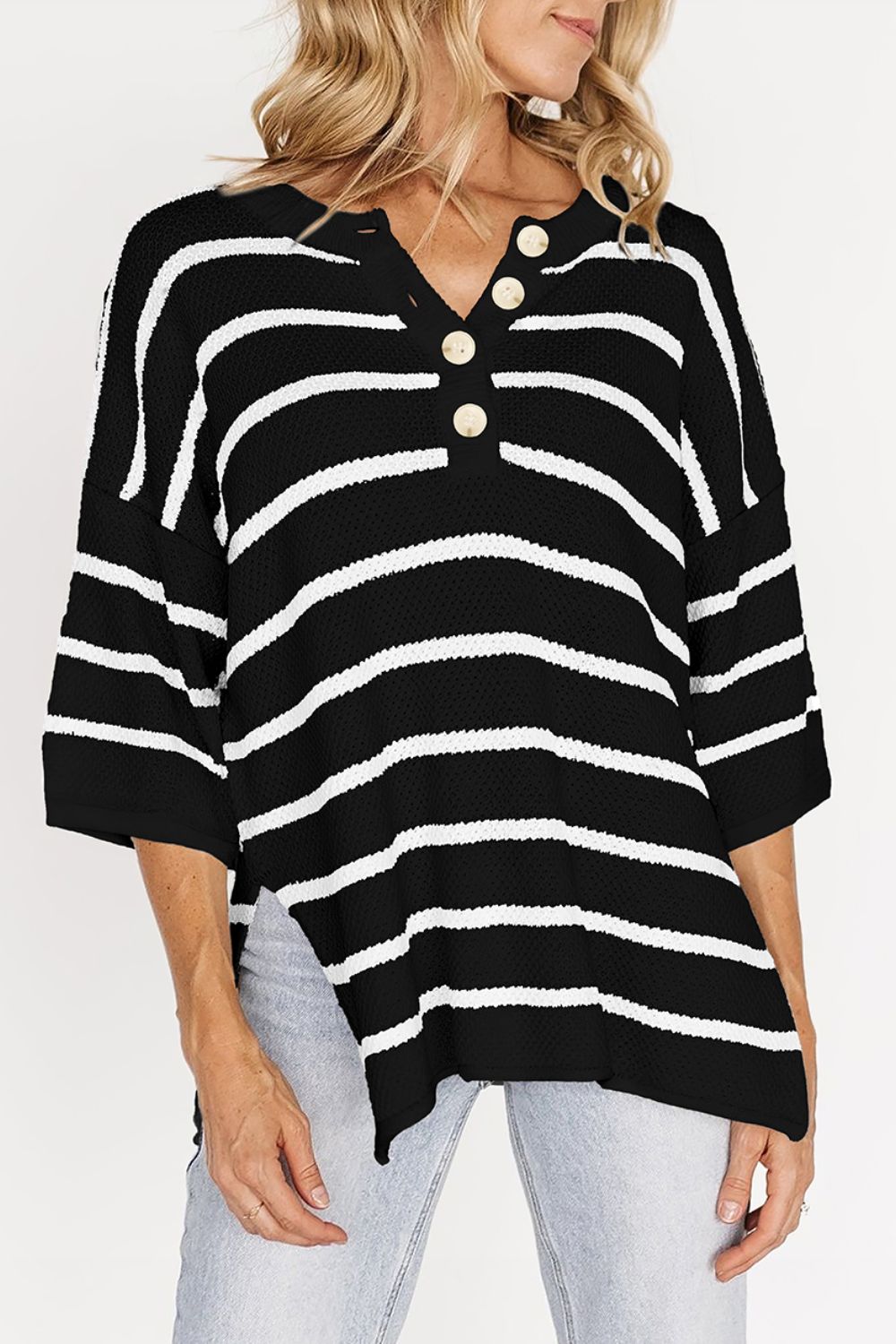 Black and white stripe knit pullover with button-down neckline and 3/4 sleeves.
