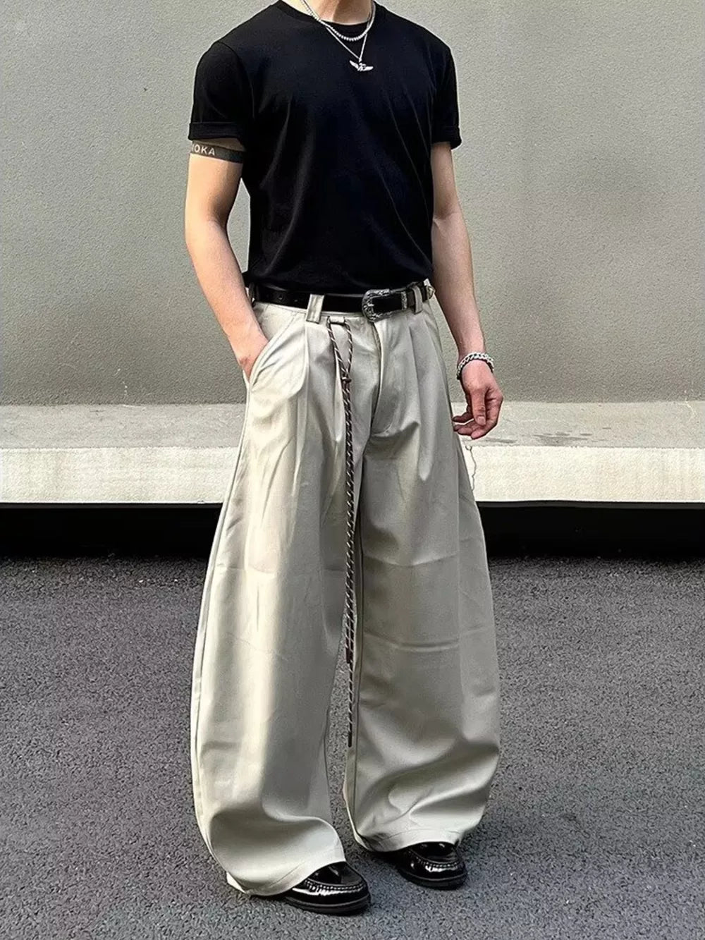 Men's wide leg joggers in apricot with a relaxed fit and pleated front.