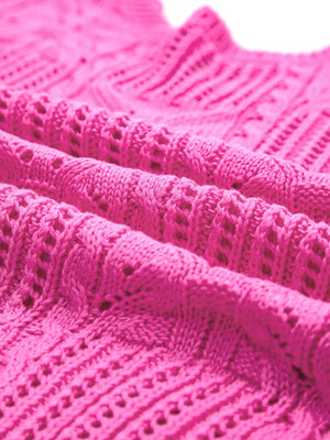 Chic openwork knit sweater vest in bright pink cotton with cable knit details.