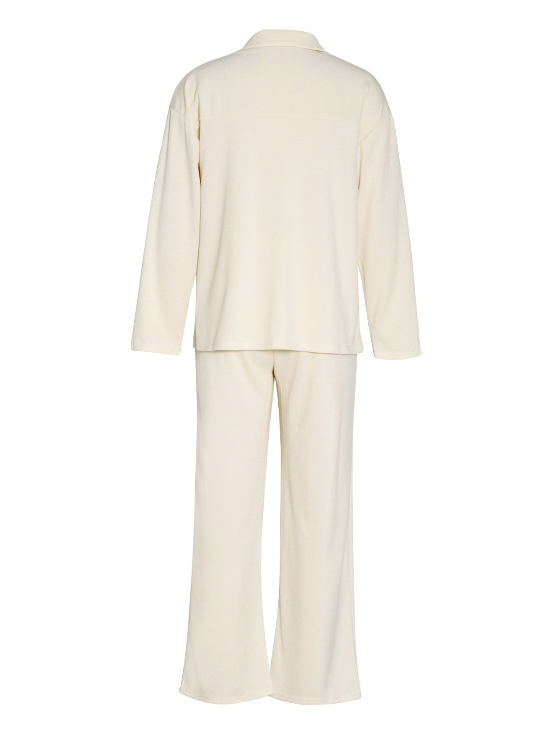 Cream ribbed knit lounge set with relaxed fit long sleeve top and wide leg pants.