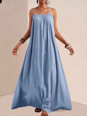 Sky blue maxi dress with spaghetti straps and gathered neckline.