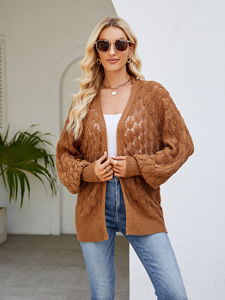 Camel open-knit balloon sleeve cardigan with diamond texture and ribbed cuffs.