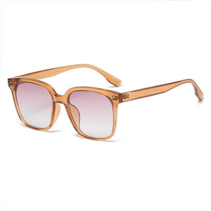 Chic square gradient tint sunglasses with clear brown frames and pink-to-white lenses.