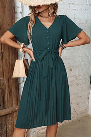 Forest green midi dress with flutter sleeves, V-neck, buttons, and pleated skirt.