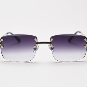 Rimless gradient tinted sunglasses with purple to clear lenses and gold accents.