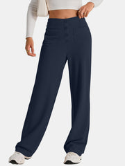 Button-front palazzo trousers in dark navy with patch pockets and a wide leg.